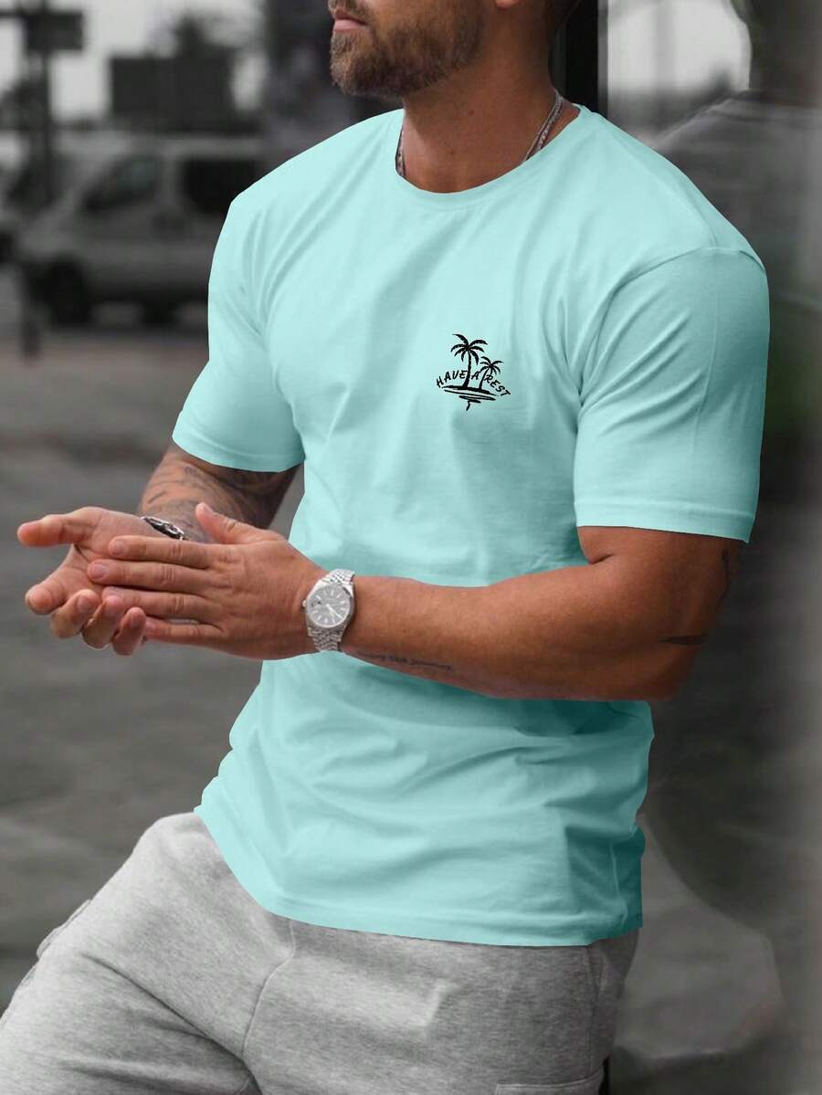 Manfinity RSRT Hombres Camiseta con estampado tropical - verde menta - Ver 1