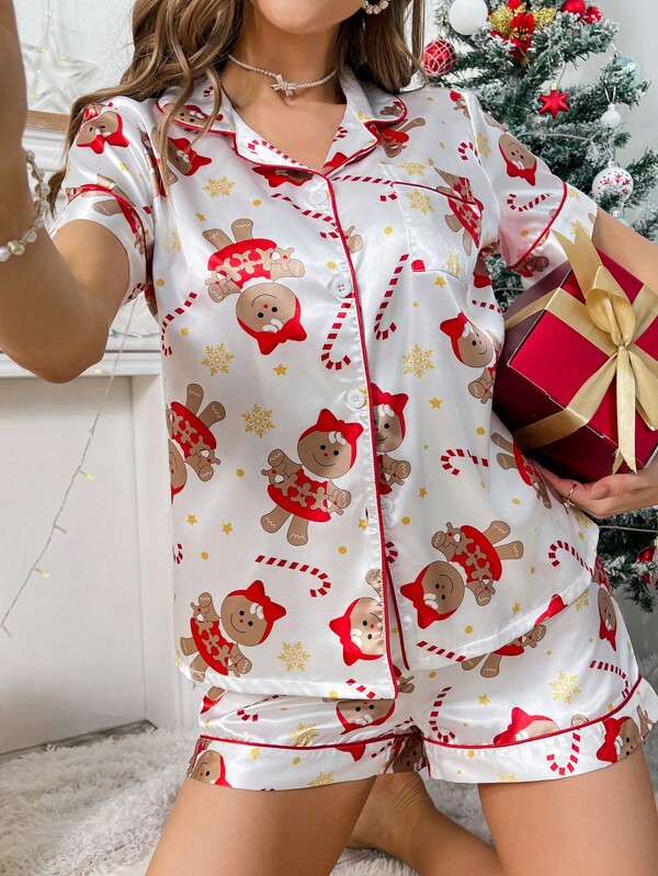 Conjunto de pijama de satén con ribetes en contraste y estampado navideño