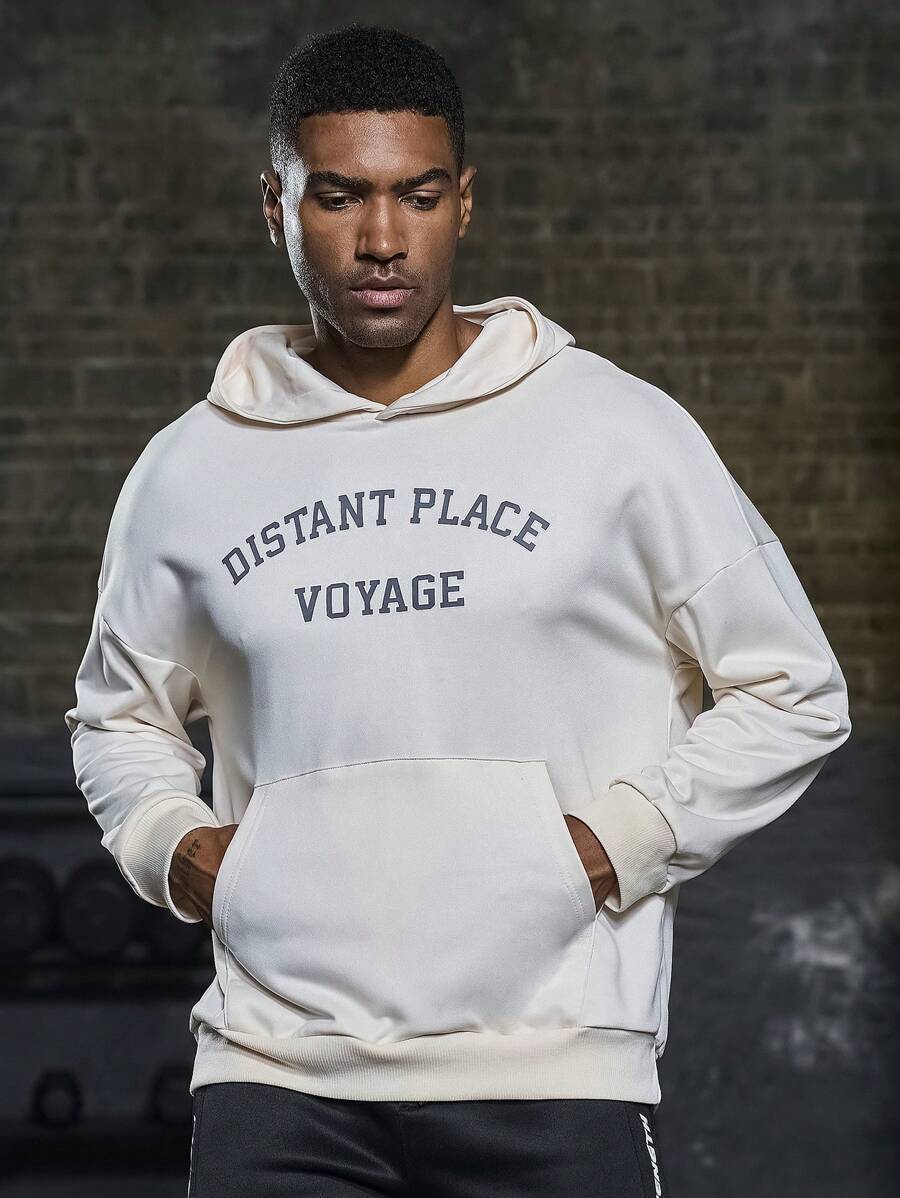 Manfinity Sport Corelite Sudadera con capucha deportiva de gráfico con lema de hombro caído para hombre