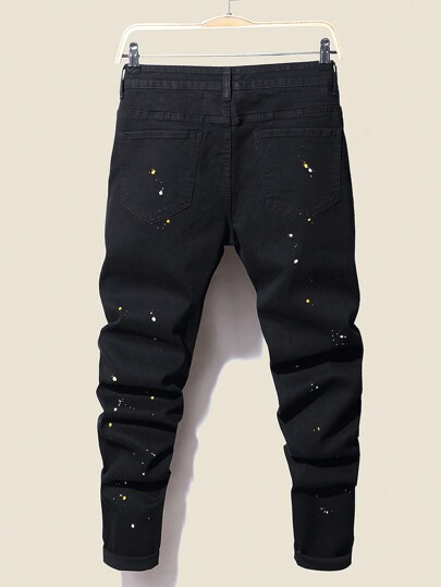 Jeans cargo noirs slim fit longs en coton pour hommes avec imprimé éclaboussure d'encre, déchirés, patchés et effilochés. Idéal pour les cadeaux de mari ou de petit ami