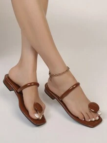 女式低跟圆扣凉鞋，简约系带设计