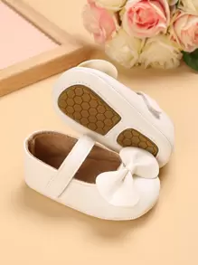 1 par de zapatos planos casuales de suela blanda con decoración de moño para niñas bebé