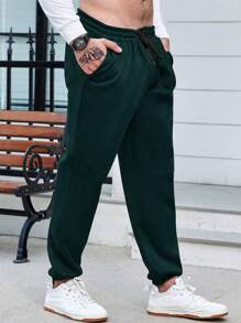 Manfinity Homme Hombres talla grande Pantalones deportivos de cintura con cordón con bolsillo oblicuo - Verde - Ver 1