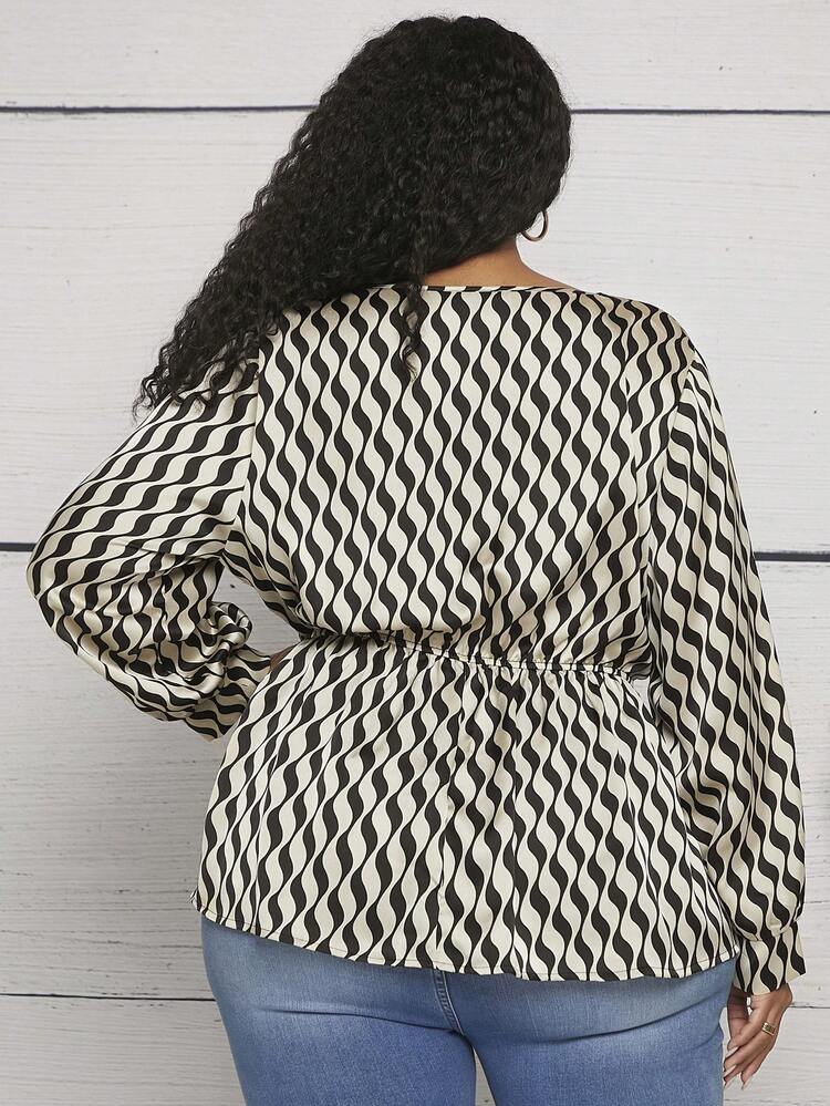 Plus Allover Print Surplice Neck Peplum Blouse