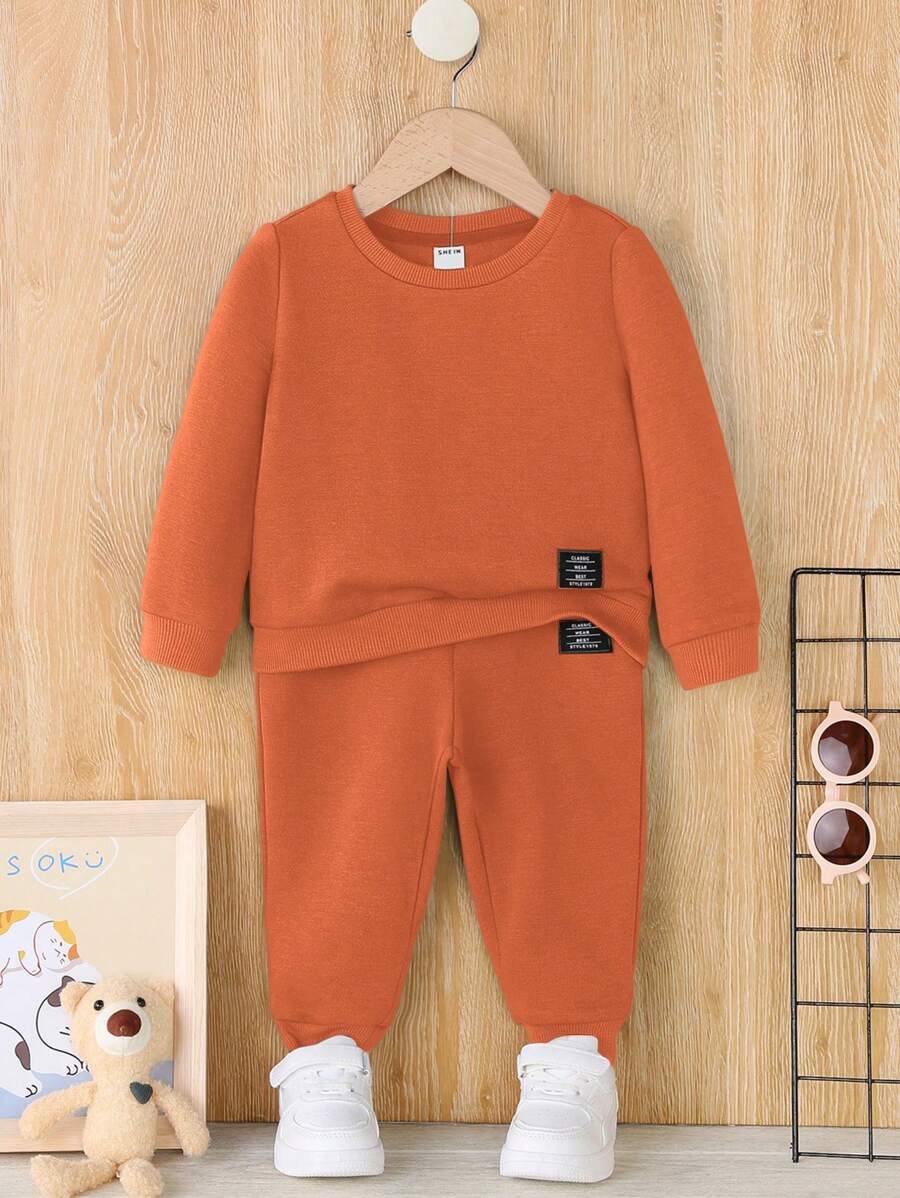 SHEIN Bộ đồ thiết kế miếng vá thoải mái giản dị cho bé trai, vải nỉ, dày - trái cam - Xem 1