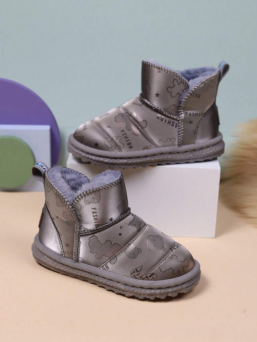 時尚和休閒流行女孩短靴帶毛茸茸襯墊