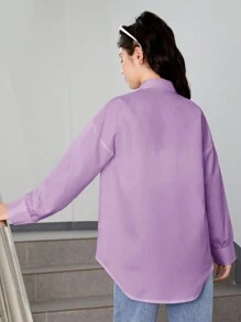 青少年女孩落肩袖口袋貼布襯衫