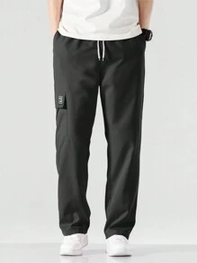 Manfinity EZcore 男士宽松工装裤，带字母贴片装饰、翻盖口袋和侧抽绳腰带，秋季