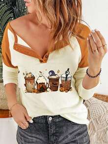 Maglietta con stampa halloween contrasto manica raglan con bottone frontale