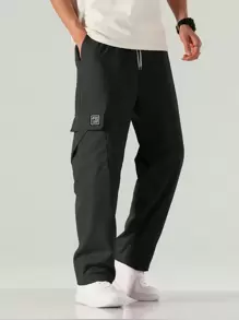 Manfinity EZcore 男士宽松工装裤，带字母贴片装饰、翻盖口袋和侧抽绳腰带，秋季