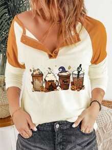 Maglietta con stampa halloween contrasto manica raglan con bottone frontale