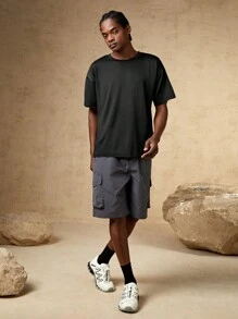 Manfinity Sport Corelite Camiseta deportiva con gráfico de letras, estilo novio para hombre - Negro - Ver 8