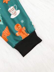 男嬰聖誕印花連身衣、運動褲和聖誕帽子