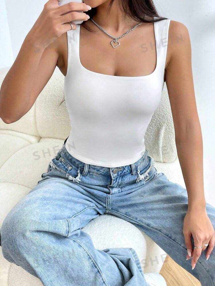 SHEIN EZwear Witte effen mouwloze crop top met dubbellaagse traceless motief SHEIN Nederland