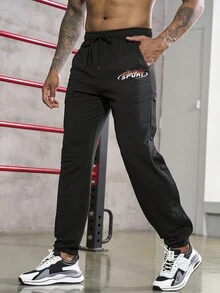 Gym Rark Men's Drawstring Sports Pants Featuring Letter Print Sweat Pants - Black - View 1