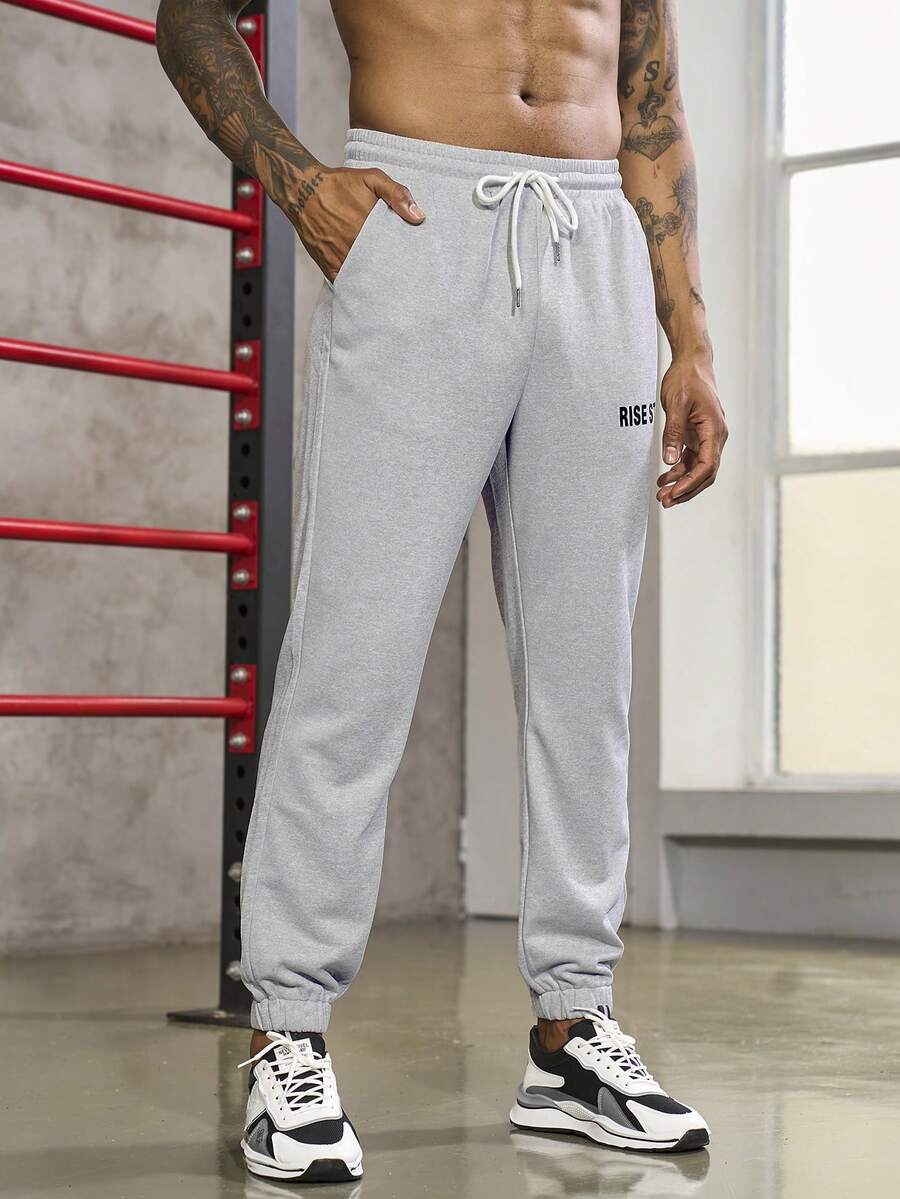 Manfinity Sport Corelite 男士字母圖案腰部抽繩斜口袋衛褲 - 淺灰色 - 查看 1