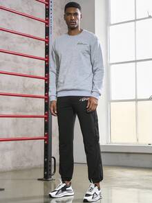 Gym Rark Men's Drawstring Sports Pants Featuring Letter Print Sweat Pants - Black - View 5
