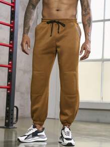 Manfinity Sport Corelite Uomo Pantaloni sportivi con grafica lettera con coulisse a vita tasca inclinata