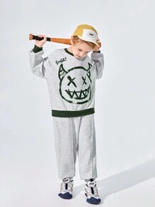 SHEIN Bộ 2 món cho bé trai tuổi teen, áo nỉ cổ tròn in họa tiết và quần nỉ màu trơn, chất liệu dày dặn. - Xám - Xem 1