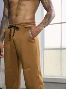 Manfinity Sport Corelite Uomo Pantaloni sportivi con grafica lettera con coulisse a vita tasca inclinata