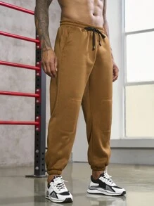 Manfinity Sport Corelite Uomo Pantaloni sportivi con grafica lettera con coulisse a vita tasca inclinata