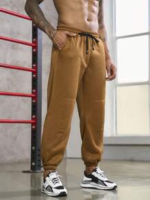 Manfinity Sport Corelite Uomo Pantaloni sportivi con grafica lettera con coulisse a vita tasca inclinata