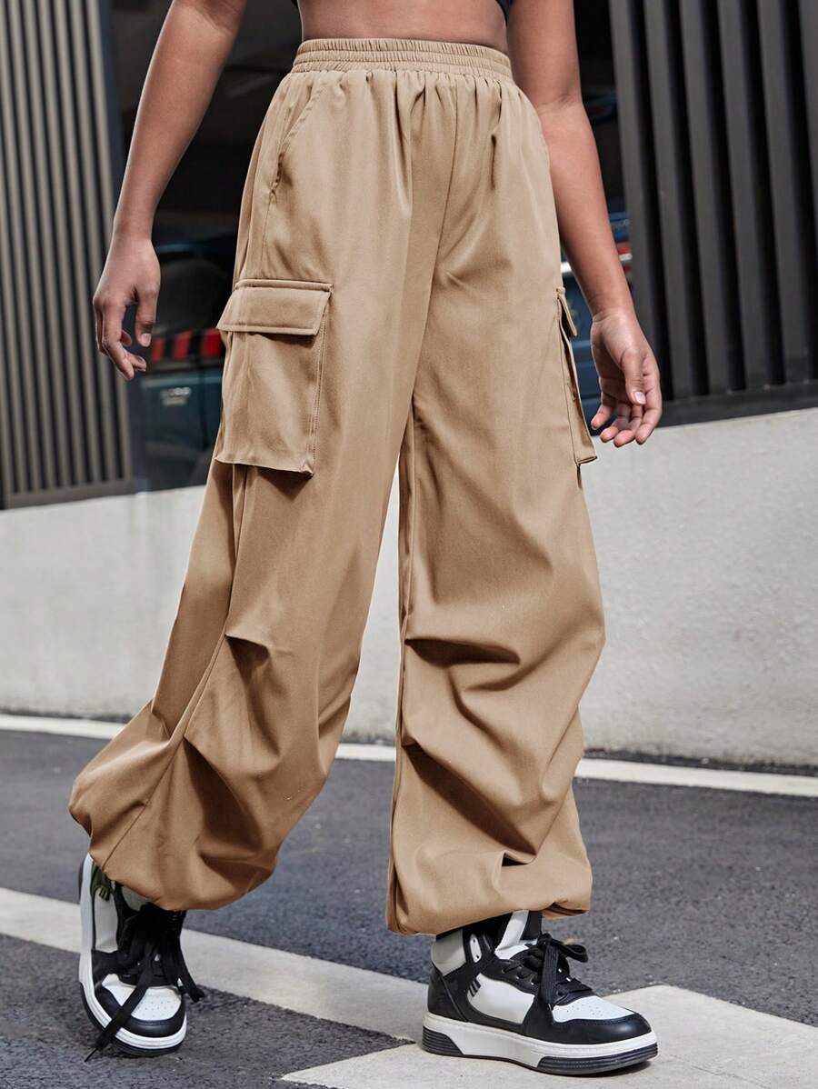 SHEIN Pantalones de cargo de unicolor tejidos informales para niñas preadolescentes con dobladillo acolchado y bolsillos con solapa - Caqui - Ver 1