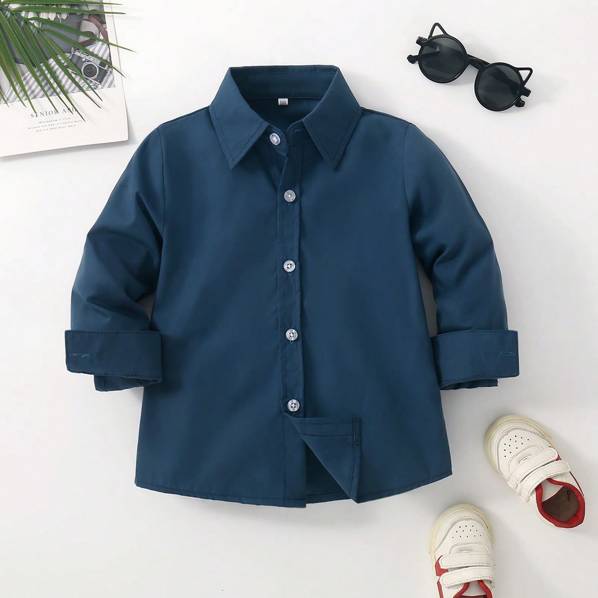 Chico joven Camisa unicolor con botón delantero