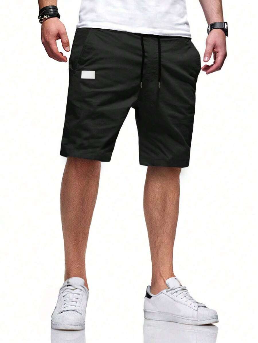 Manfinity Homme 男士宽松斜口袋抽绳腰短裤