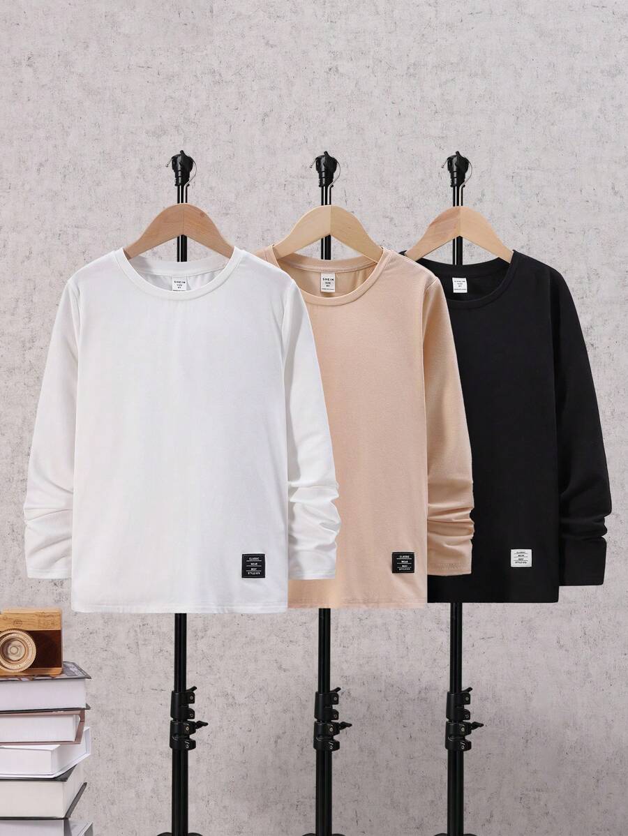 SHEIN Tween Boy Loose Fit Casual Solid Color Round Neck Long Sleeve Knit T-Shirt - Black - View 1