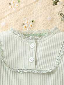 女嬰蕾絲邊條紋針織上衣