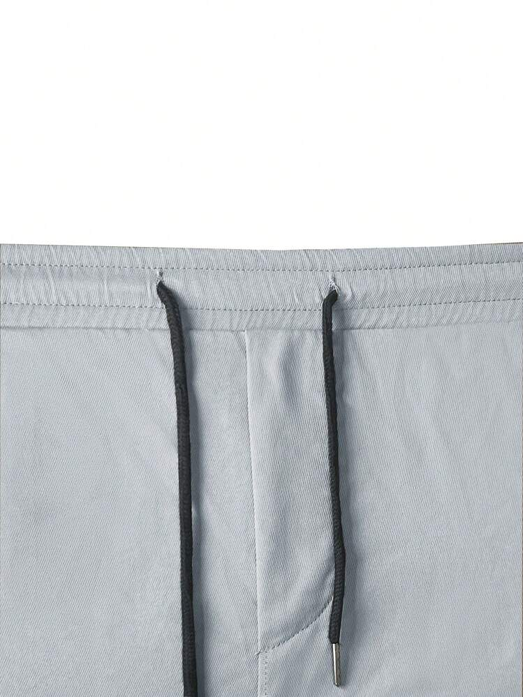 ROMWE Street Life سروال رجالي بجيوب رقعة جانبية وخ...