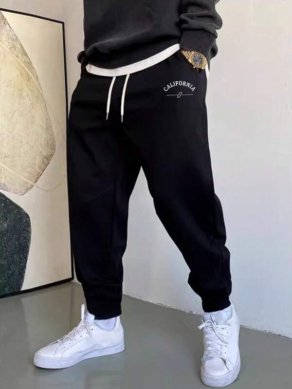 Manfinity Hypemode Hombres Pantalones deportivos con estampado de letra de cintura con cordón