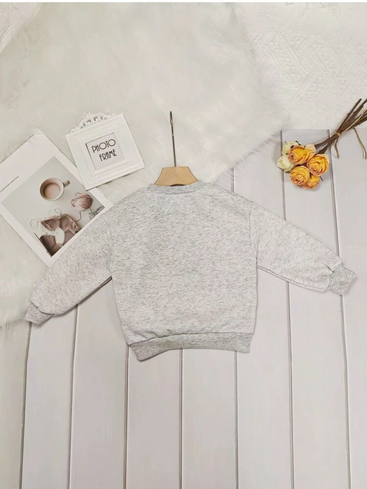 Young Girl Cartoon And Slogan Graphic Sweatshirt