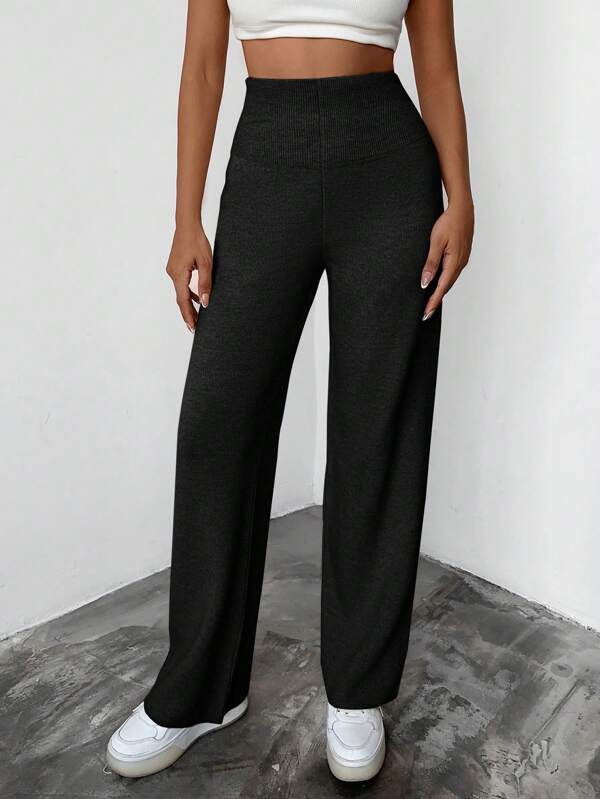 Pantalones unicolor de pierna ancha tejido