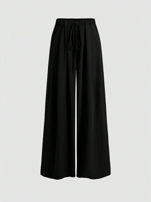 Weite Hose mit Bindegürtel und Große Größen