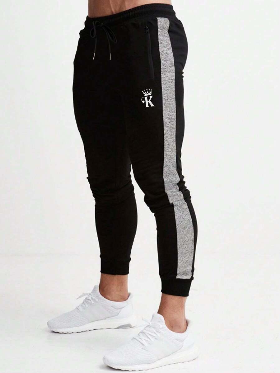 Manfinity Fitness Men Crown & Letter Graphic Contrast Side Seam Drawstring Waist Sports Trousers - Black - View 1