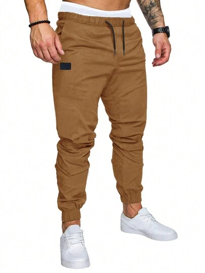 Manfinity Homme Pantalones holgados con cordón en la cintura y parches, para otoño