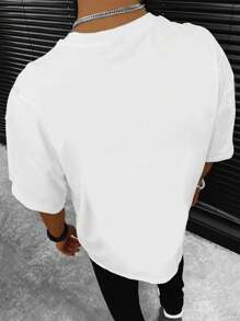 EASEVO Camiseta urbana holgada con estampado gráfico de dinosaurio de talla grande para hombre, ropa de dinosaurio de verano