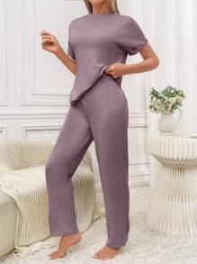 Conjunto de pijama de camiseta y pantalones de punto acanalado