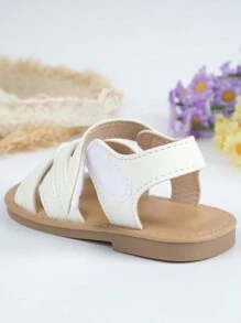 1雙實色嬰兒涼鞋，白色，適合女孩的時尚簡約風格