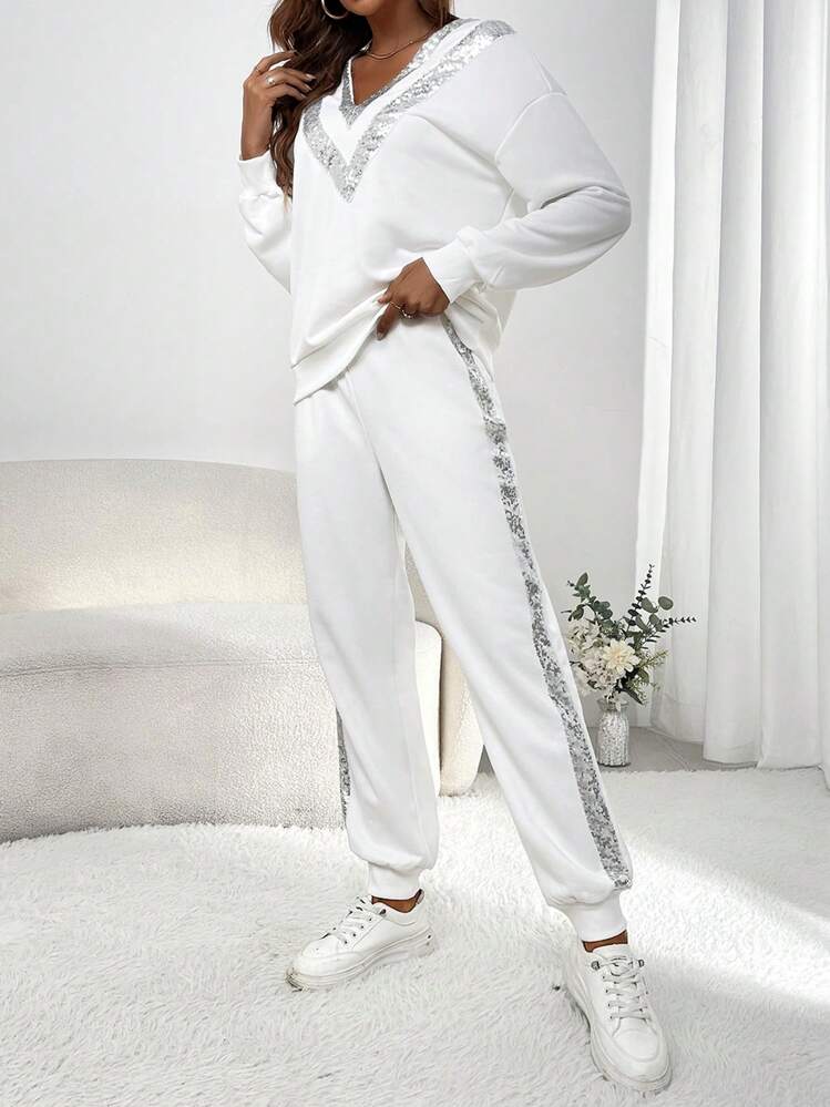 SHEIN LUNE Sudadera y pantalón de chándal con hombros caídos y lentejuelas en contraste, informal - Blanco - Añade 5