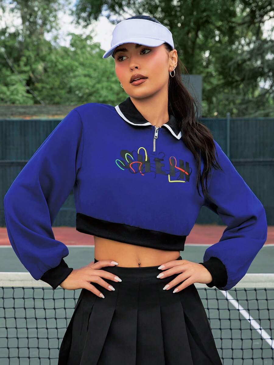 VARSITIE Đồ họa Chữ cái Viền tương phản Một nửa khóa kéo Áo len crop - Xanh đậm - Xem 1