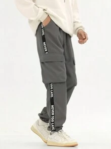 SHEIN Chico preadolescente Pantalones cargo con cinta con letra con bolsillo lateral con solapa de rayas