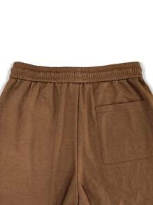 Manfinity Roghcode Quần nỉ nam dáng rộng có họa tiết chữ Slogan và dây rút ở eo, quần nỉ mặc đi chơi dạo phố cỡ lớn, quà tặng cho chồng, bạn trai - màu nâu - Xem 6