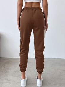 EURMUSE Women'S Elastic Waist Flap Pocket Tapered Joggers