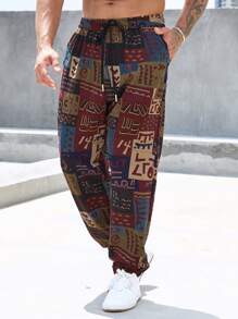 Manfinity RSRT Calças Longas Tapered Men Plus Patchwork Print com Cordão na Cintura, Gráficos Coloridos de Harém, Tamanho Casual - Multicolorido - Visão 1