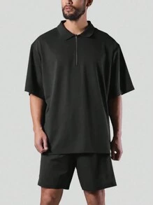 Manfinity Sport Corelite Herren Sport Polo Shirt mit halbem Reißverschluss, einfarbig, Workout Tops, Golf Shirt - Schwarz - Übersicht 1