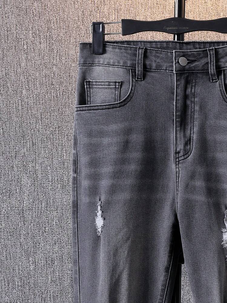 Teenager Junge Jeans mit Riss, Riss, Waschung