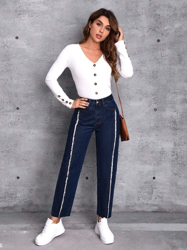 Raw Trim Tapered Jeans